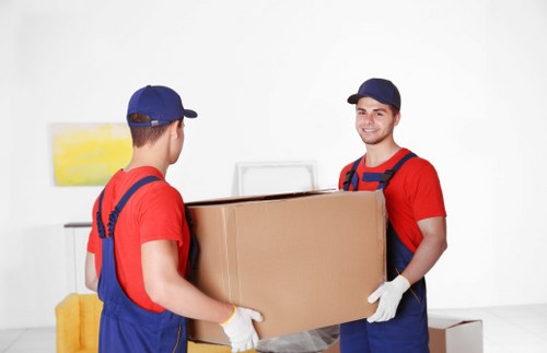 Flat removals team preparing a move in a Tooting apartment building