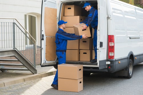 Removal van loading boxes near a Tooting residential street
