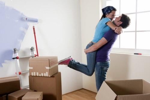 Careful handling of furniture during a flat move in Tooting