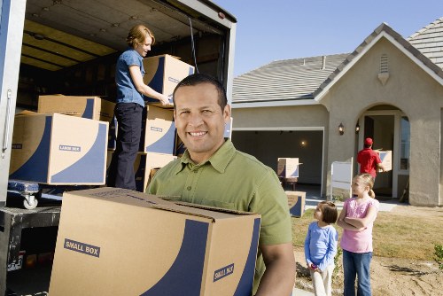 Careful handling of belongings during a flat move in Tooting